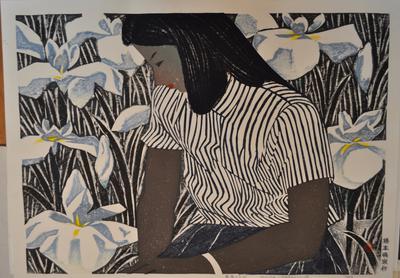 girl in striped blouse with white and blue irises
